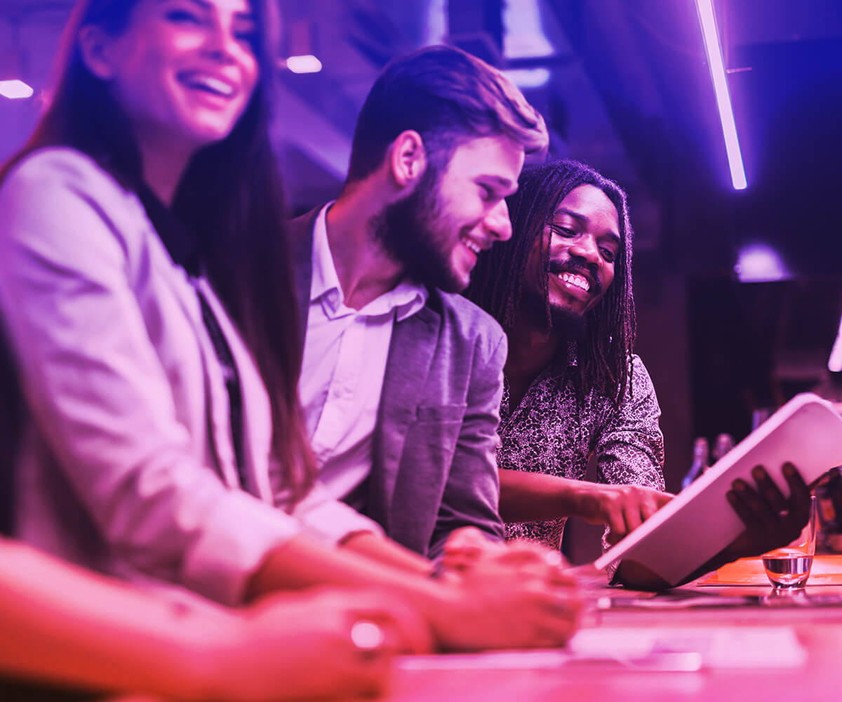 Young professionals collaborating during a modern, vibrant learning experience